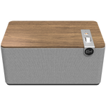 Premium klases galda skaļrunis ar klasisku koka dizainu un modernām audio tehnoloģijām, paredzēts augstas kvalitātes mājas audio pieredzei.