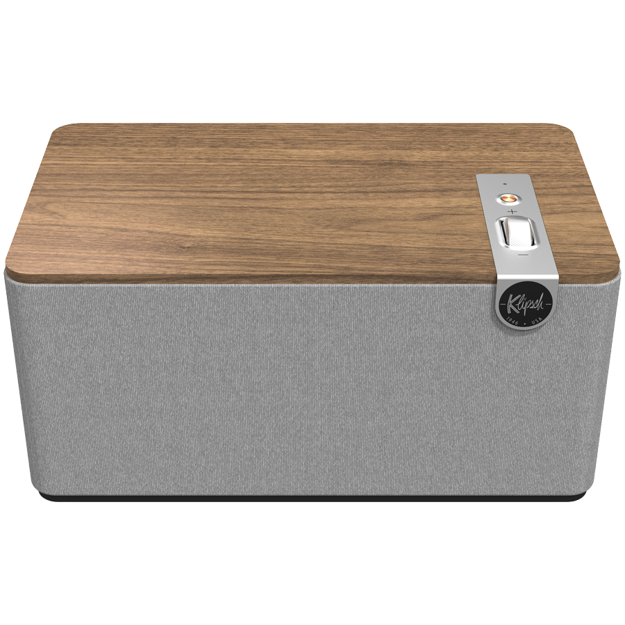 Premium klases galda skaļrunis ar klasisku koka dizainu un modernām audio tehnoloģijām, paredzēts augstas kvalitātes mājas audio pieredzei.