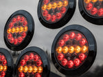 10-30V LED aizmugurējais lukturis, ECE R148, EMC R10, IP67, melns, kreisais/labais