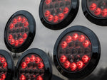 10-30V LED aizmugurējais lukturis, ECE R148, EMC R10, IP67, melns, kreisais/labais