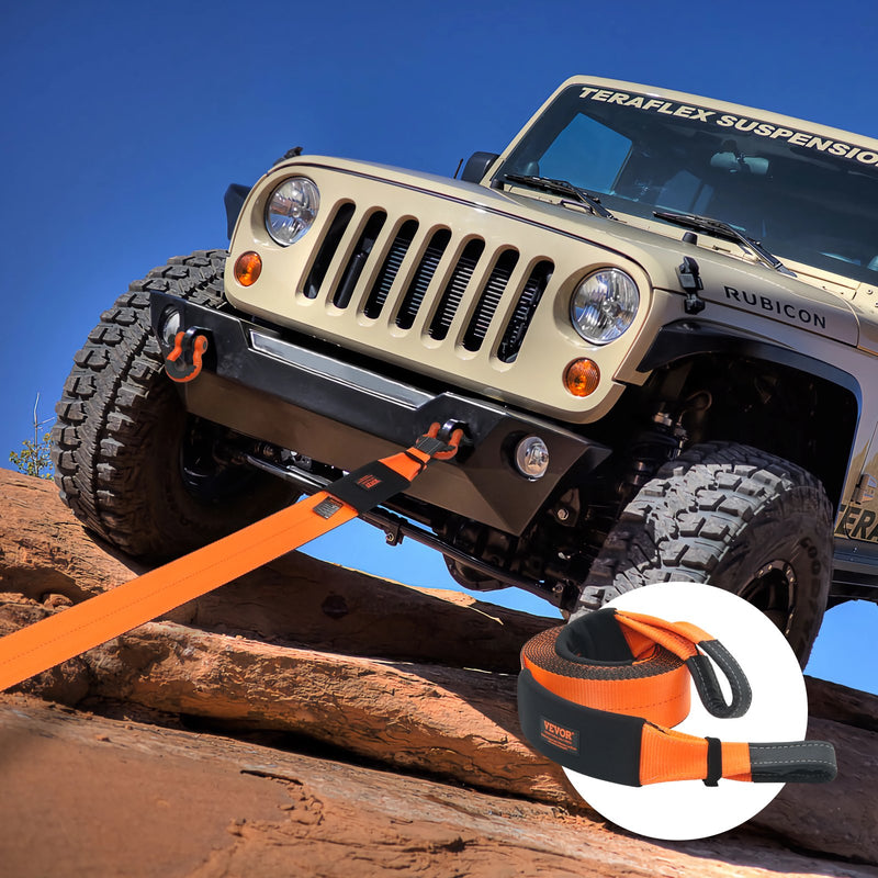 Vilktroses siksna 10,2 cm x 9,1 m, 21 099 kg plīsuma izturība, trīskārši pastiprinātas cilpas, piemērota koku aizsardzībai, bezceļa vilkšanai un atgūšanai, izturīga pret ekstremāliem laikapstākļiem, ar aizsarguzmavām un glabāšanas somu