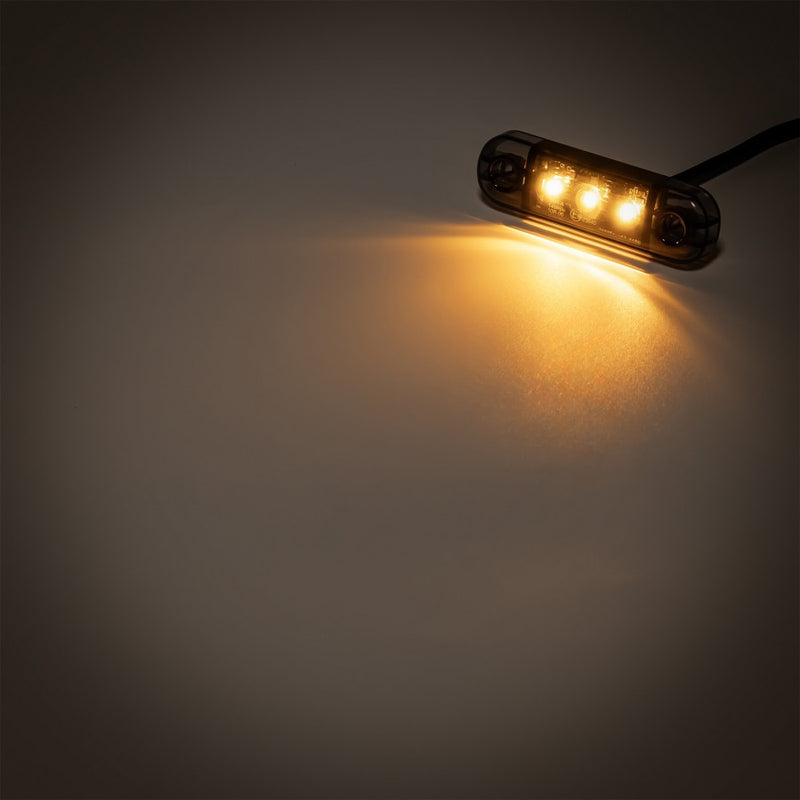 KAMAR L1318 3LED sānu gabarītlukturis, 0,4/0,8W, 12/24V, IP67, tumši tonēts korpuss, oranža gaisma, 30cm kabelis, R10/R148, 2 gadu garantija
