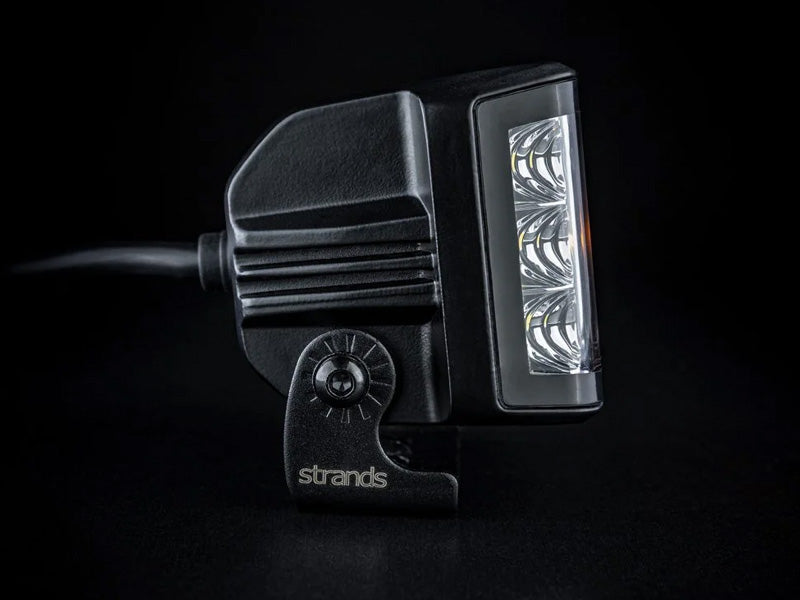 9-32V 8400Lm STRANDS(Zviedrija)  LED papildlukturis, IP67/69K, EMC ECE R10, 93,00 x 74,00 x 74,00 mm, vads 500mm, garantija 3 gadi, auksti balta gaisma 6000K