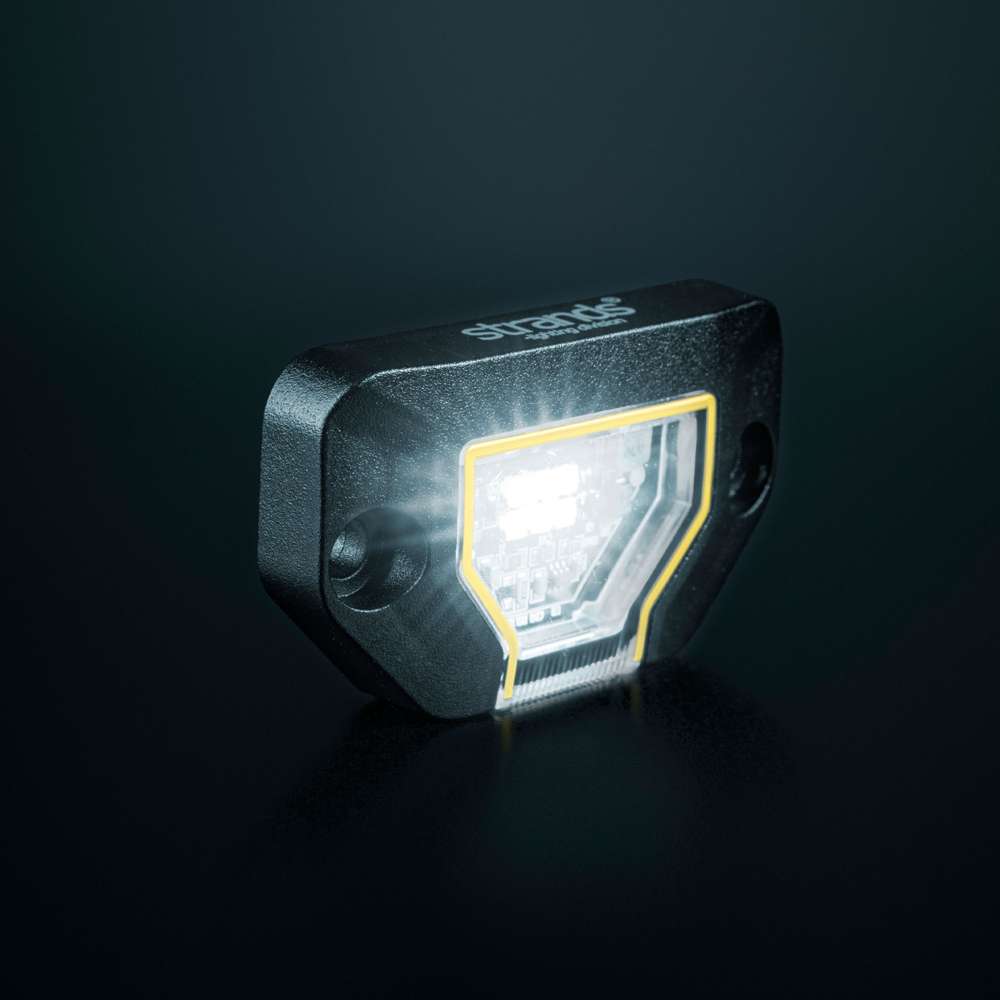 Strands Unity Rock Light balta LED pozīcijas un darba lampa 780 lm, 5700 K, 10–32 V DC, Flood Beam, IP69K, melna korpusa izpildījumā