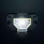 Strands Unity Rock Light balta LED pozīcijas un darba lampa 780 lm, 5700 K, 10–32 V DC, Flood Beam, IP69K, melna korpusa izpildījumā