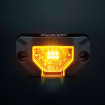Strands Unity Rock Light oranža LED pozīcijas un darba lampa 340 lm, 10–32 V DC, Flood Beam, IP69K, melna korpusa izpildījumā