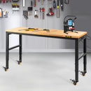 VEVOR height adjustable work table, 122 x 51 cm x 79-104 cm height, 720 kg load capacity, with power sockets, solid wood top, steel frame and swivel castors, suitable for office and home