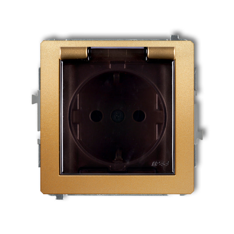 1-viet. kontaktligzdas meh. ar aizsardz. pret šļakatām DECO ar zemējumu SCHUKO 2P+Z (caurspīdīgs pārsegs), z/a, IP44, zelta kr.