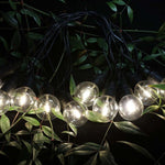 12m pikk päikesepaneeliga LED-valguspael (1,12W) koos 10 LED 0,5W G50 pirniga, IP44, 3000K.
